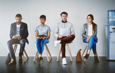 Shot of a group of young businesspeople waiting in line for a job interview - www.daval.uk
